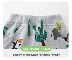 Detail of elastic waistband on grey cotton boys' shorts with cartoon animal print