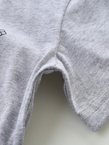 Boys grey cotton t-shirt sleeve cuff detail showing high-quality stitching and fabric