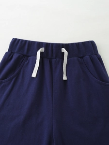 Summer boys dark blue knit cotton shorts with elastic waistband and white drawstring ties