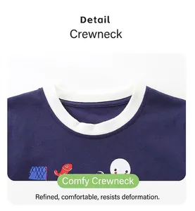 Detail of navy blue kids t-shirt with ribbed crew neck and cartoon fish print