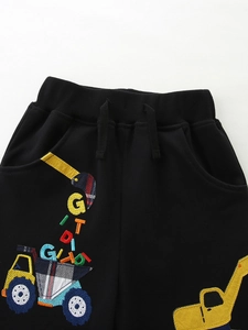 Kids black knitted sweatpants with colorful excavator embroidery and elastic waistband