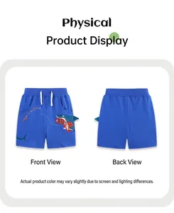 Detail of blue boys shorts featuring shark embroidery and unique 3D fin side decorations