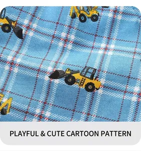 Vue détaillée du short en coton pour garçon avec motif pelleteuse jaune et carreaux bleus