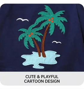 Close-up of tropical palm tree embroidery on navy blue knitted cotton boy shorts