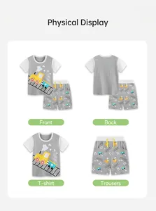 Detail view of boys' grey t-shirt and shorts set with cartoon train prints and yellow drawstring