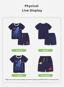 Macro view of navy cotton summer set for boys with ocean prints and yellow drawstrings
