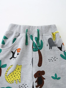 Grey cotton kids shorts with colorful animal glow prints and green adjustable drawstring