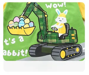 Detail of soft cotton kids t-shirt featuring cartoon bunny driving a green excavator