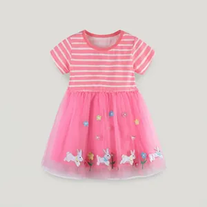Detail of pink striped bodice and layered mesh skirt with rabbit and flower embroidery