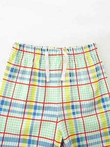 Boys multi-color plaid shorts with elastic waist and white cotton drawstring detail