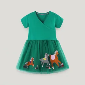 Detail of emerald green short sleeve girls dress with V-neck and cartoon horse embroidery