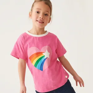 Close-up of pink girls cotton t-shirt featuring heart and rainbow print with white collar