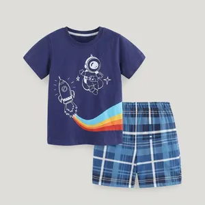 Detail of boys summer set with astronaut printed navy t-shirt and blue checkered shorts