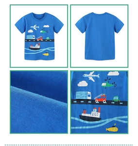 Detail view of cotton t-shirt with colorful cartoon transport prints and fabric texture