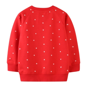 Red long sleeve crewneck sweatshirt for girls featuring white polka dots all over