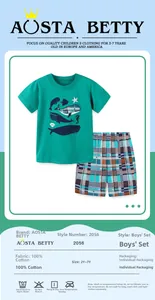 Detail of boys summer 100% cotton set with whale print green tee and plaid shorts