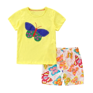 Mädchen Sommer-Set mit zitronengelbem Schmetterlings-T-Shirt und bedruckten weißen Shorts