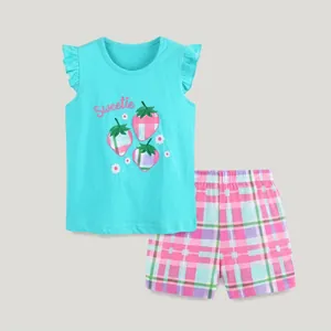 Detail of girls' light blue sleeveless top with strawberry print and checkered shorts