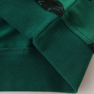 Dark green boys' long sleeve sweatshirt with ribbed cuffs and unique printed paneling