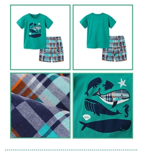 Detailed view of kids' summer set featuring sea life print and checkered cotton shorts