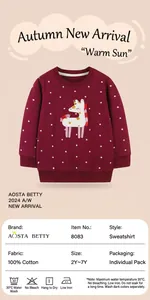 Detail of 100% cotton girls sweatshirt featuring a 3D unicorn embroidery and polka dots