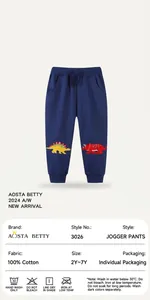 Detail of dark blue cotton joggers with colorful dinosaur embroidery and drawstring waist