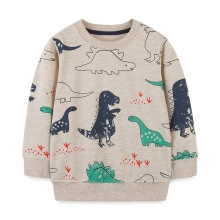 Vue détaillée du sweat beige à manches longues pour enfants avec motifs dinosaures