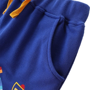 Boys navy blue cotton sweatpants with elastic yellow drawstring waist and cartoon print
