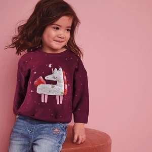 Girls long sleeve purple sweatshirt featuring unicorn sequin embroidery and denim jeans
