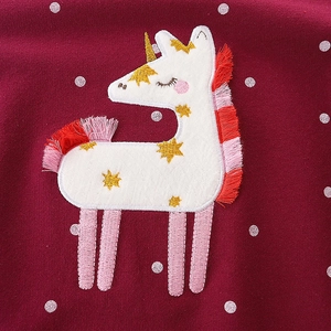 Girl's burgundy sweatshirt with embroidered unicorn and 3D tassel detail in polka dot print