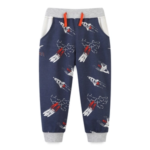 Dark blue boys jogger pants featuring rocket print and grey ribbed elastic cuffs