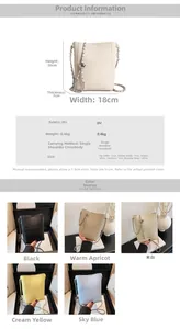 Close-up of litchi grain PU leather texture and metal chain strap on this bucket bag