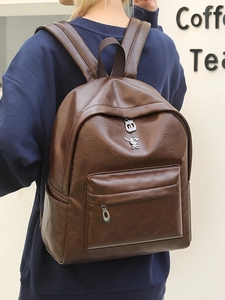 Deep coffee brown PU leather backpack with a cute silver rabbit logo for women