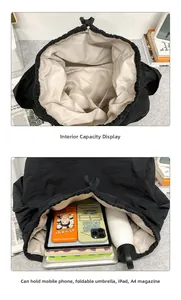 Détail du grand sac noir à cordon montrant la capacité pour iPad et livres A4