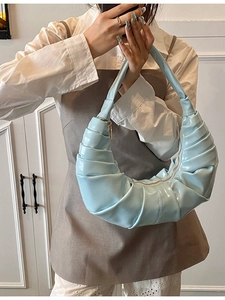 Fashionable light blue pleated dumpling handbag with glossy patent leather for women