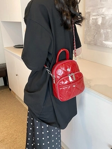 Chic red quilted square bag with silver chain strap and flower logo for women