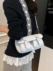 Sleek grey vintage shoulder bag with dual buckle front pockets for women's spring style