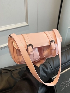 Pink faux leather shoulder bag with dual front pockets and wide strap for women