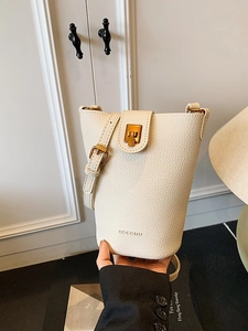 Fashionable white lychee pattern leather bucket bag with gold metal buckle closure