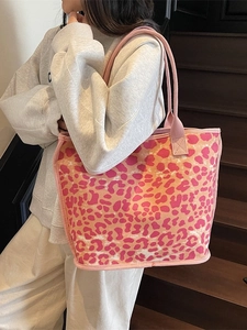 Chic pink and orange leopard print canvas tote bag with woven straps for women