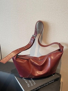 Fashion burgundy leather hobo bag with wide adjustable eyelet strap and half-moon design