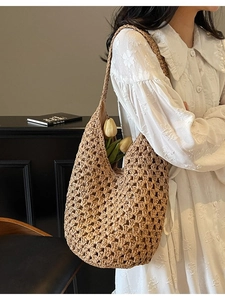 Hollow out woven straw shoulder bag with minimalist design for beach and casual travel