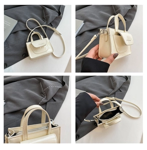 Glänzende cremefarbene Lackleder-Minitasche mit Vordertasche und verstellbarem Gurt