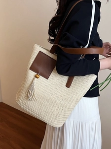Large summer woven straw tote bag with brown leather patch and stylish wooden bead tassels