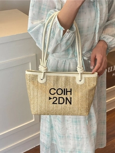 Women's woven beach tote bag with COIH 2DN embroidery and cream leather straps