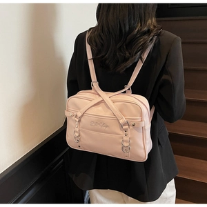 Pink Japanese JK style backpack featuring letter embroidery and silver hardware details