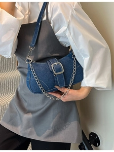 Blue denim crossbody bag for women with silver chain strap and buckle detail