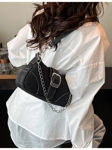 Black denim crossbody bag with white stitching and silver metal buckle for women