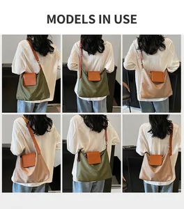 Détail montrant les sacs fourre-tout plissés en vert foncé et kaki portés par des mannequins