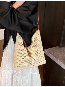 Bohemian summer woven beach tote bag in creamy white with brown leather shoulder strap